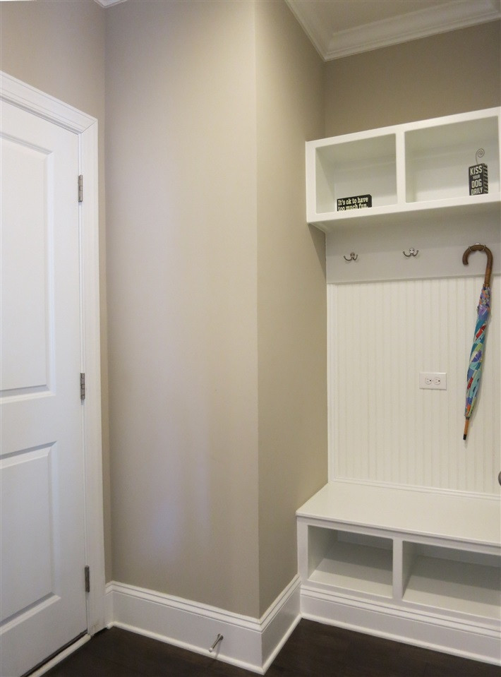 3916 Rock Rose Lane Raleigh, NC 27612 - Photo 9 of 25 Off the Kitchen is the Mud Rm w/bench, cubbies & hooks that leads to the attached 2-car Garage. Mud Rm