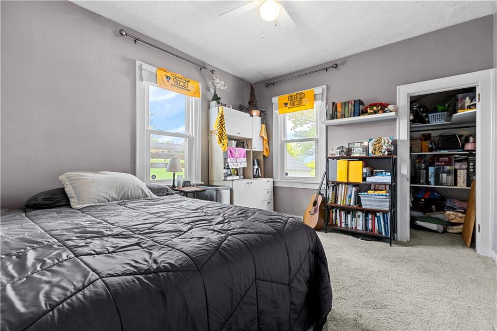 1415 Anderson Road Pittsburgh, PA 15209 - Photo 13 of 25 a bedroom with a bed and a window