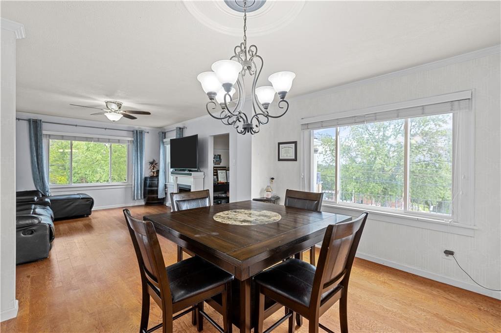 1415 Anderson Road Pittsburgh, PA 15209 - Photo 8 of 25 a view of a dining room with furniture window and wooden floor