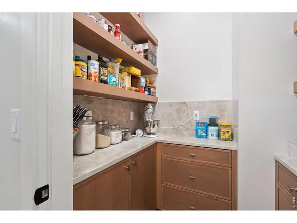 a kitchen with a sink and a stove
