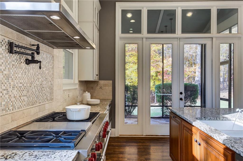 3640 Rivers Call Boulevard Atlanta, GA 30339 - Photo 16 of 63 a bathroom with a granite countertop sink and a mirror