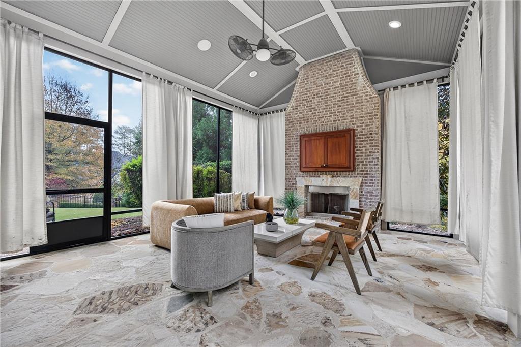 3640 Rivers Call Boulevard Atlanta, GA 30339 - Photo 17 of 63 a living room with furniture and a fireplace
