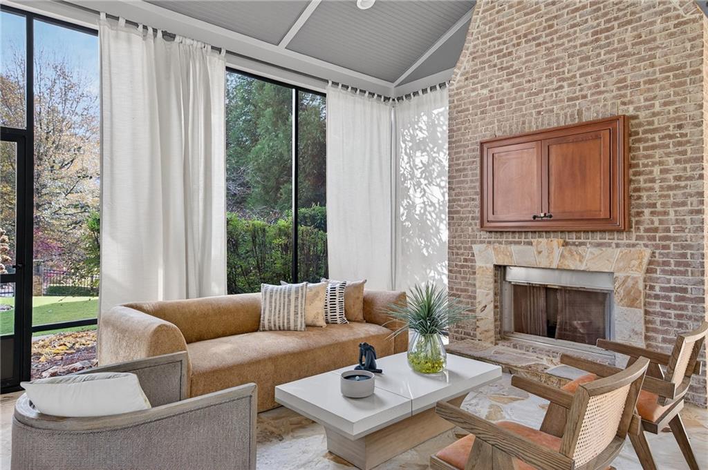 3640 Rivers Call Boulevard Atlanta, GA 30339 - Photo 19 of 63 a living room with furniture and a fireplace