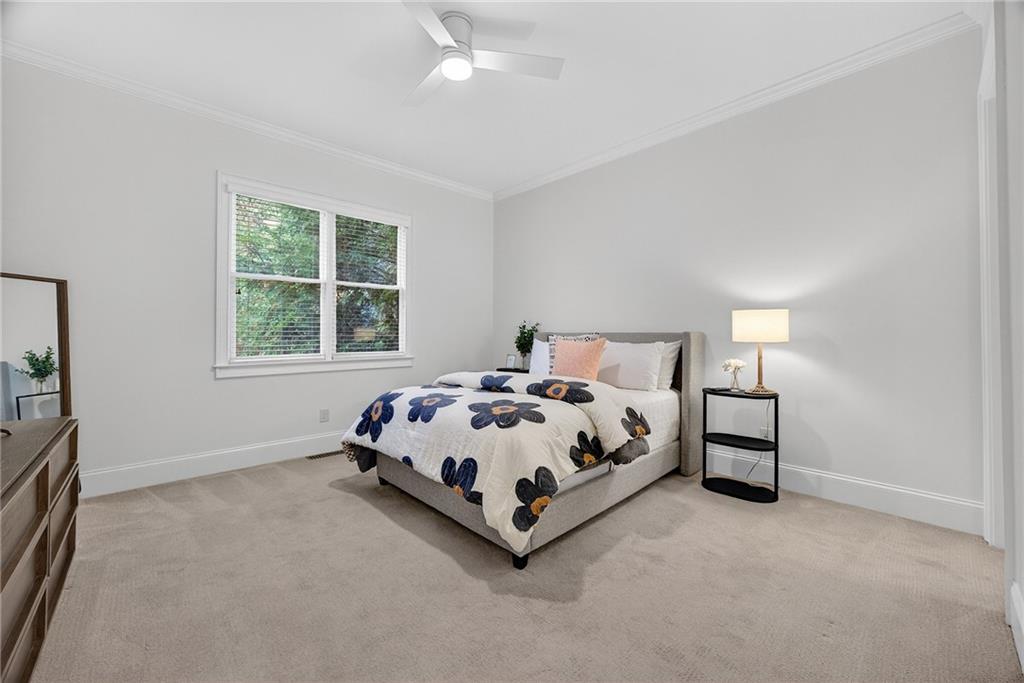 3640 Rivers Call Boulevard Atlanta, GA 30339 - Photo 30 of 63 a bed sitting in a bedroom next to a window