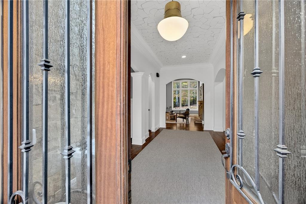 3640 Rivers Call Boulevard Atlanta, GA 30339 - Photo 3 of 63 a view of a hallway with wooden floor and windows