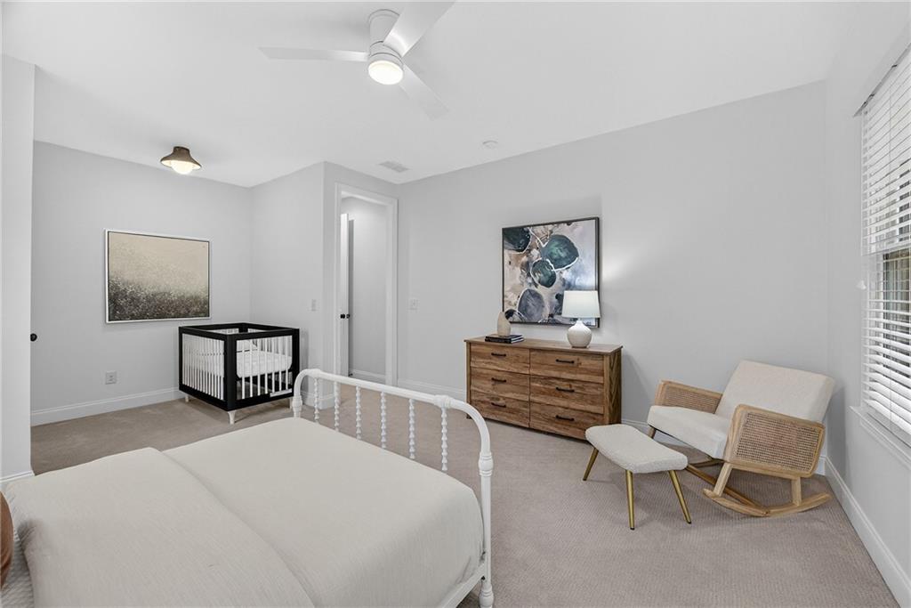 3640 Rivers Call Boulevard Atlanta, GA 30339 - Photo 41 of 63 a bedroom with furniture and a window