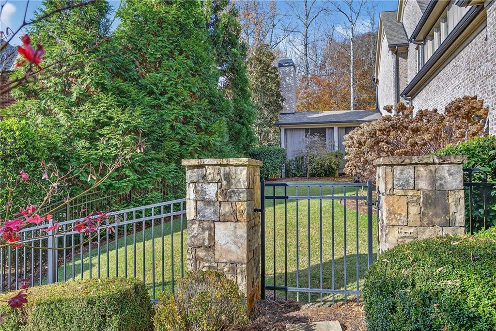 3640 Rivers Call Boulevard Atlanta, GA 30339 - Photo 62 of 63 a view of a house with a small yard and plants