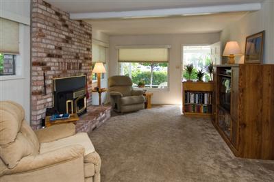 1805 Spring Mountain Road St. Helena, CA 94574 - Photo 3 of 9 Family room with brick hearth and fire place with pellet insert.