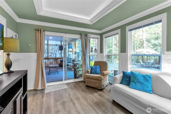 a living room with furniture and a gate