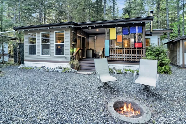 a view of a chair and table in the patio