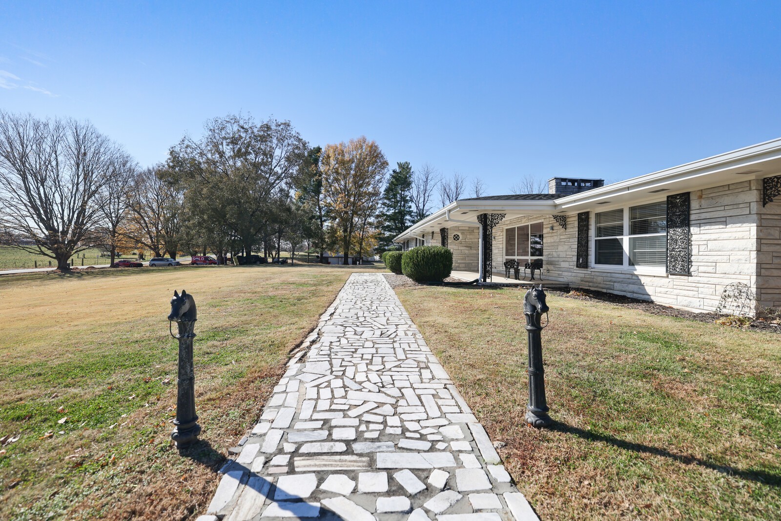 676 Ferguson Hill Road Lafayette, TN 37083 - Photo 4 of 89 a front view of a house with a yard