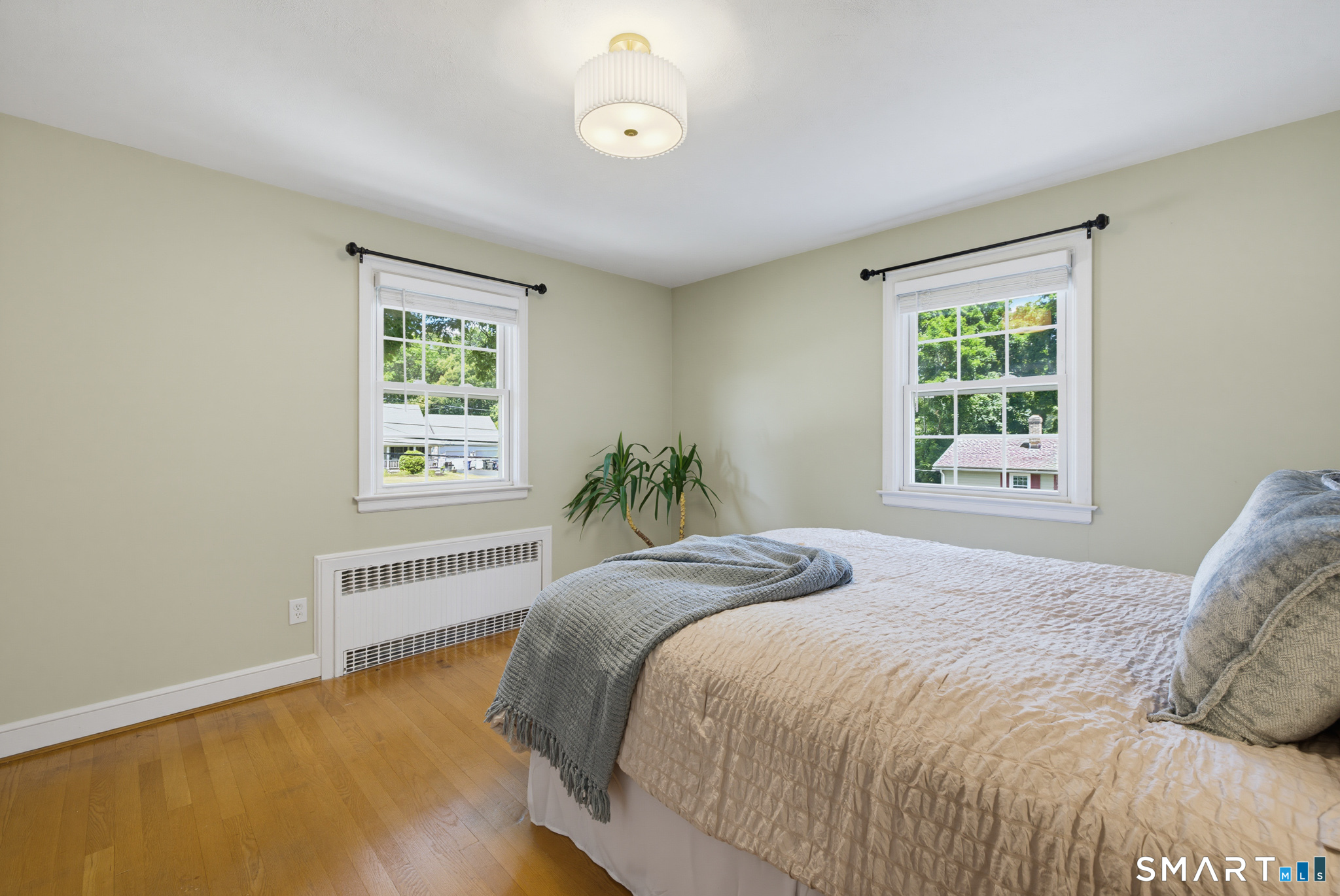 224 Spring Street Manchester, CT 06040 - Photo 18 of 39 a bedroom with a bed and a window