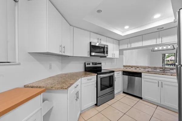 $350,000 | 600 Uno Lago Drive, Unit 104, Juno Beach, FL 33408