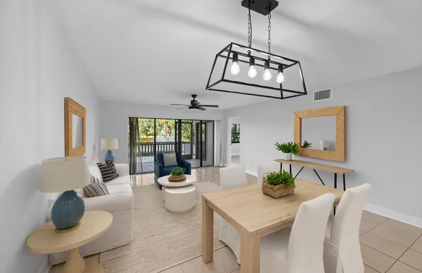 $350,000 | 600 Uno Lago Drive, Unit 104, Juno Beach, FL 33408