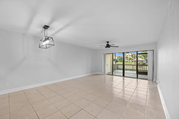 $350,000 | 600 Uno Lago Drive, Unit 104, Juno Beach, FL 33408