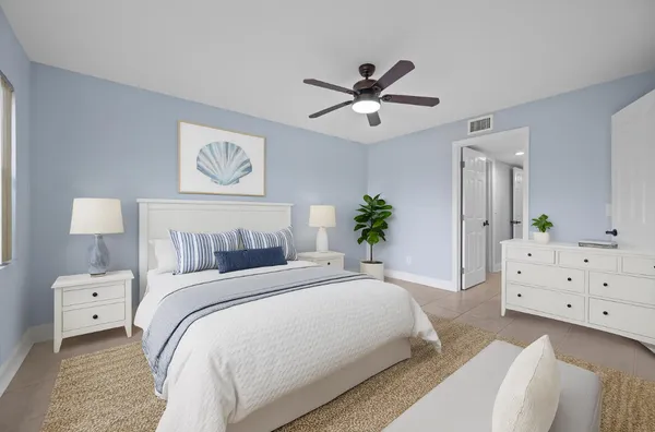 $350,000 | 600 Uno Lago Drive, Unit 104, Juno Beach, FL 33408