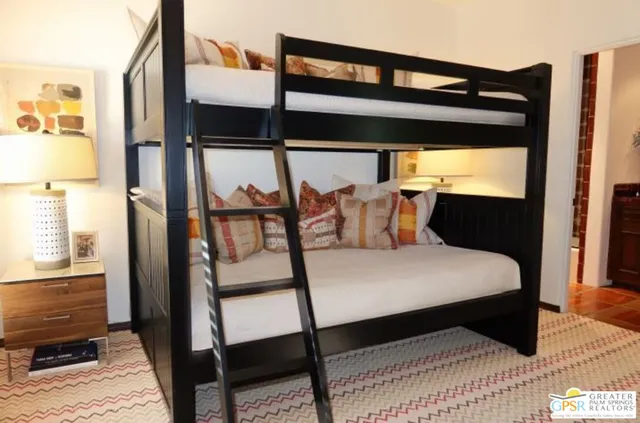 a bathroom with a bathtub and a window