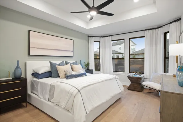 a bedroom with bed and window