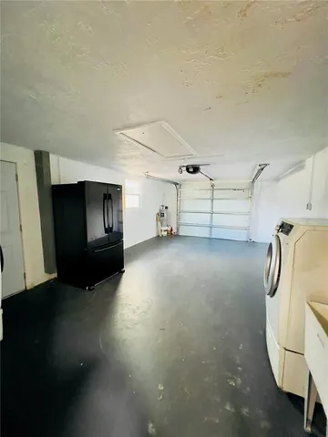 a view of a garage with furniture