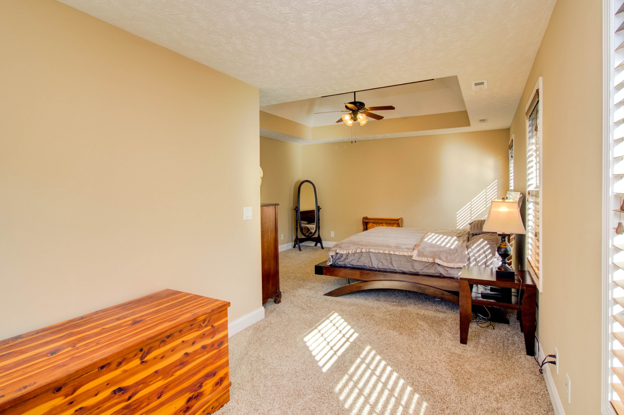 4190 Trough Springs Road Adams, TN 37010 - Photo 24 of 50 a bedroom with a bed and a mirror