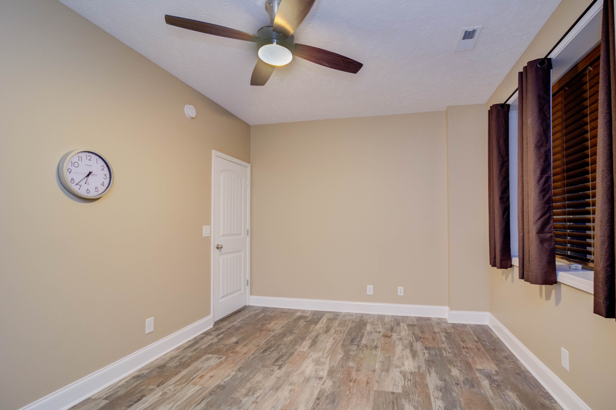 4190 Trough Springs Road Adams, TN 37010 - Photo 38 of 50 wooden floor in an empty room