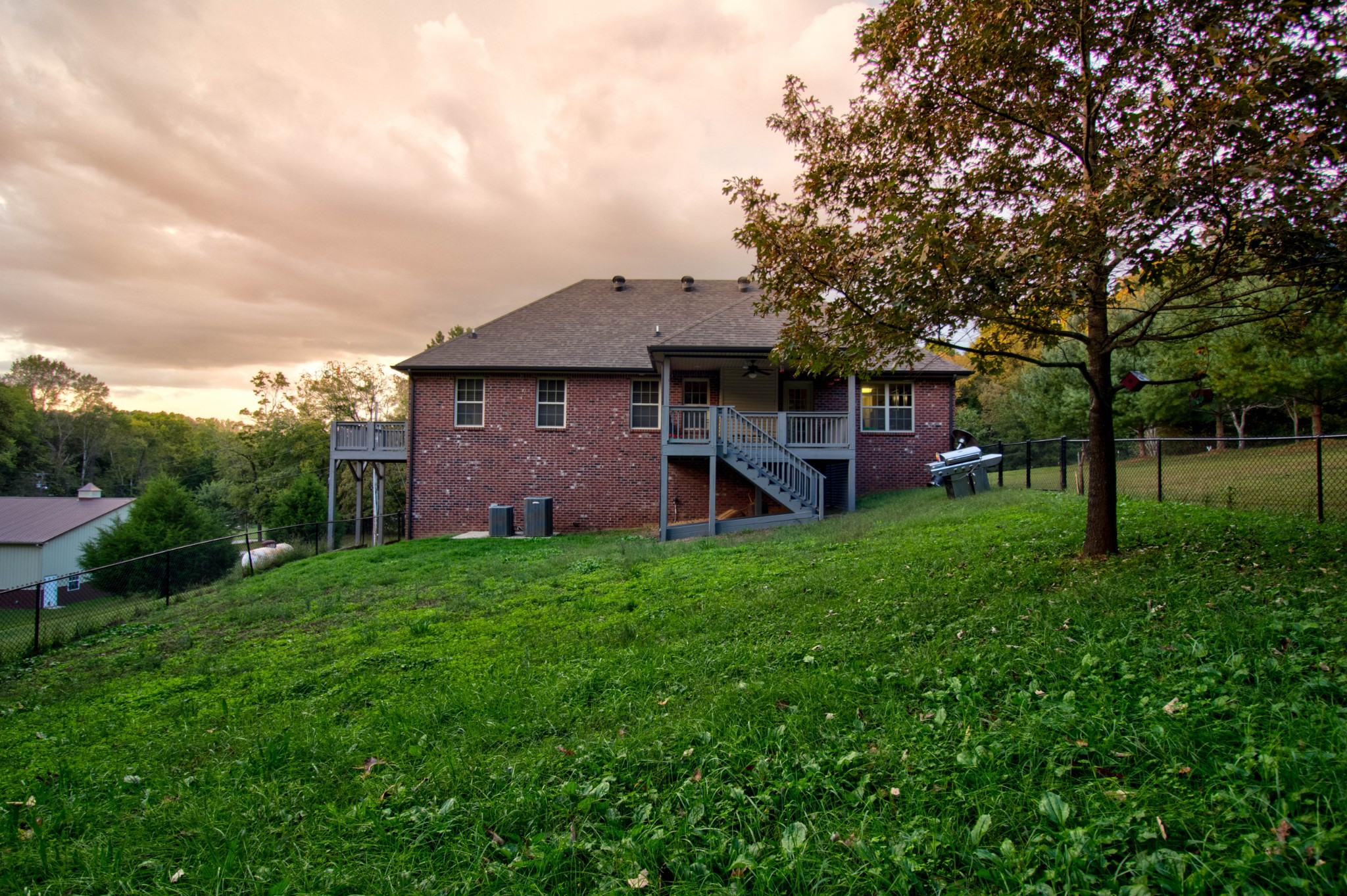 4190 Trough Springs Road Adams, TN 37010 - Photo 40 of 50 a front view of a house with garden