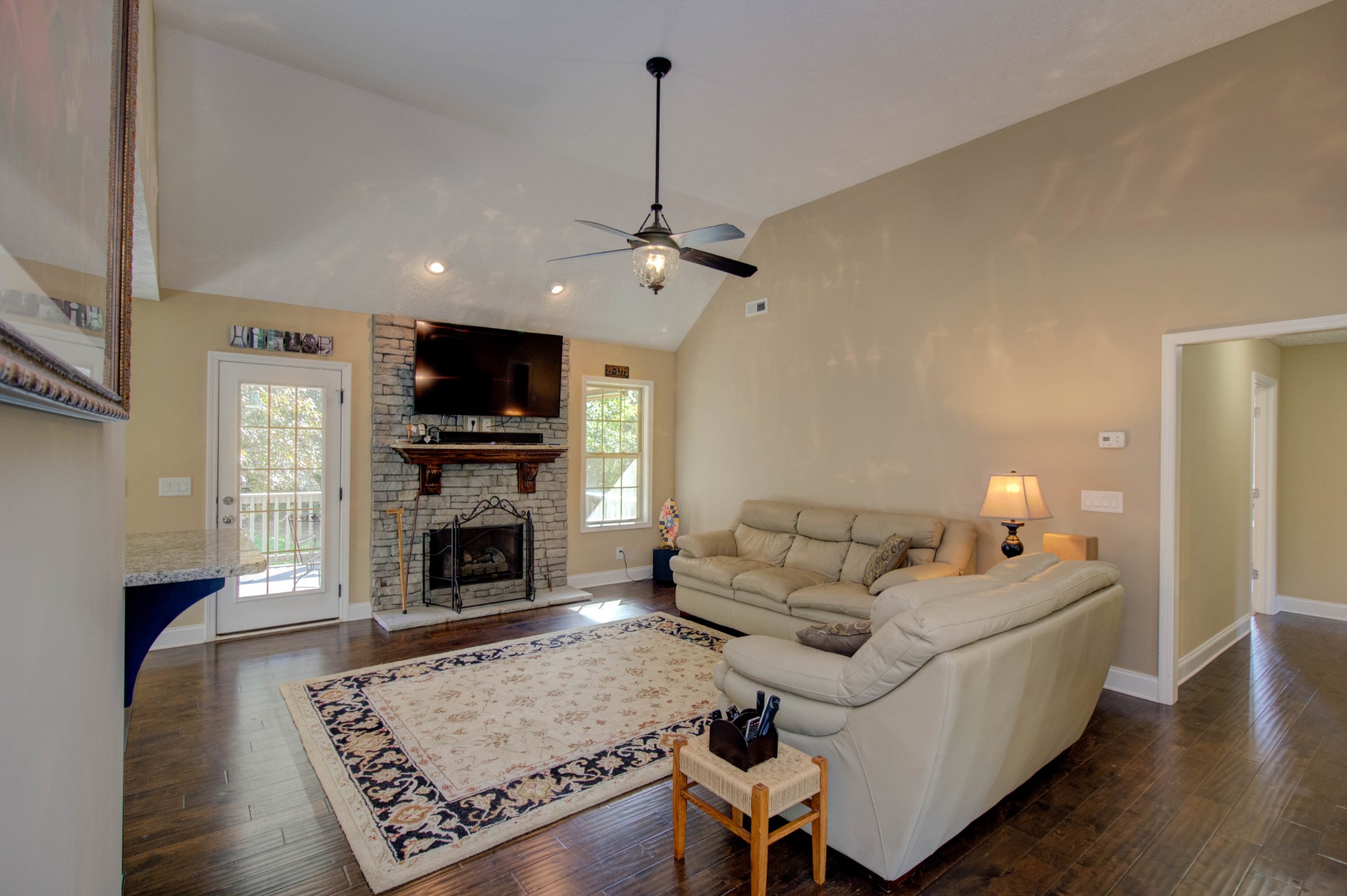 4190 Trough Springs Road Adams, TN 37010 - Photo 8 of 50 a living room with furniture and a fireplace