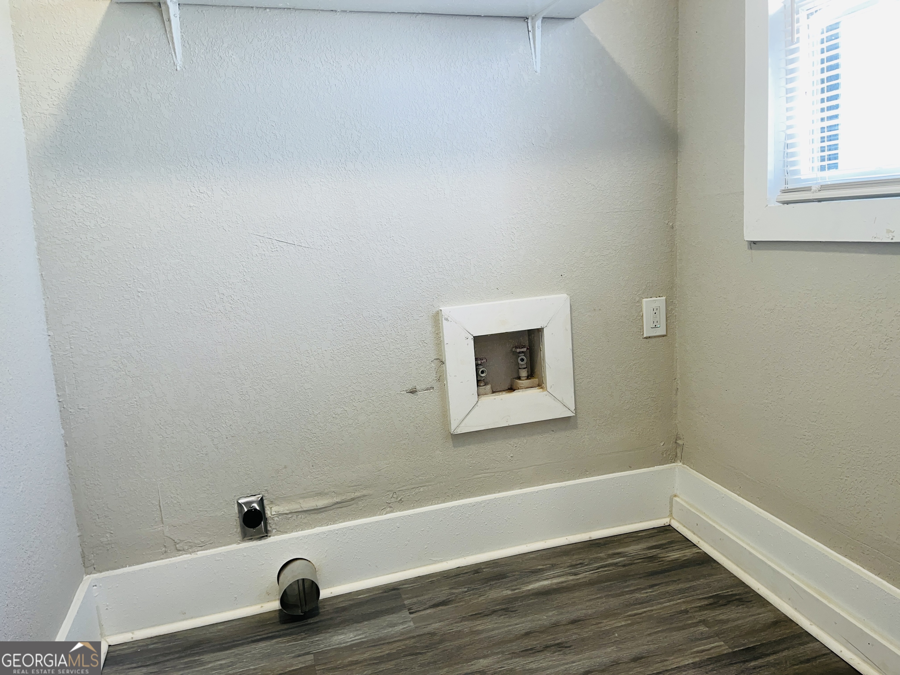 1318 Forrest Avenue LaGrange, GA 30240 - Photo 21 of 23 a view of a small space with wooden floor and a window