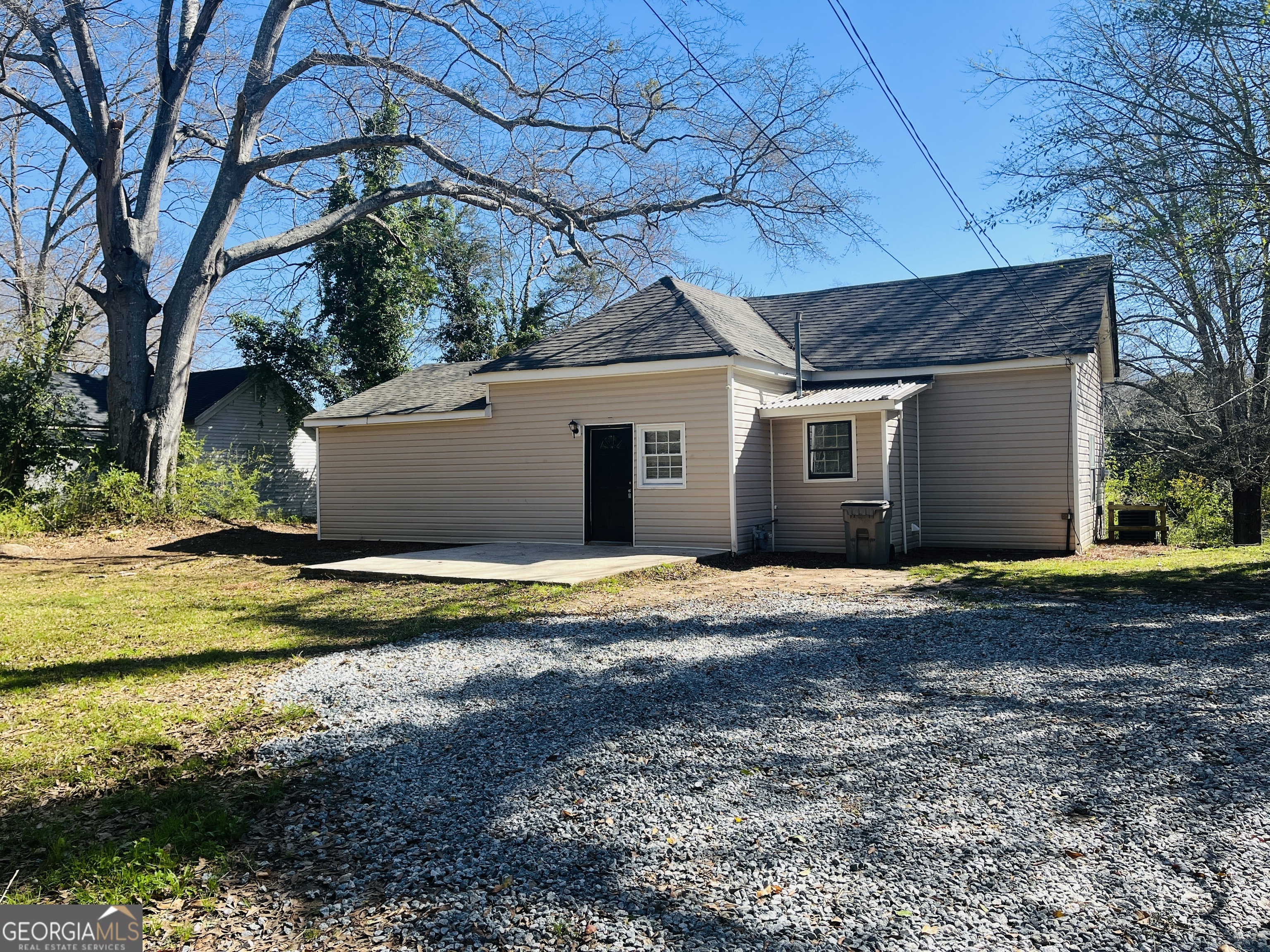 1318 Forrest Avenue LaGrange, GA 30240 - Photo 22 of 23 a view of a house with a yard and large tree