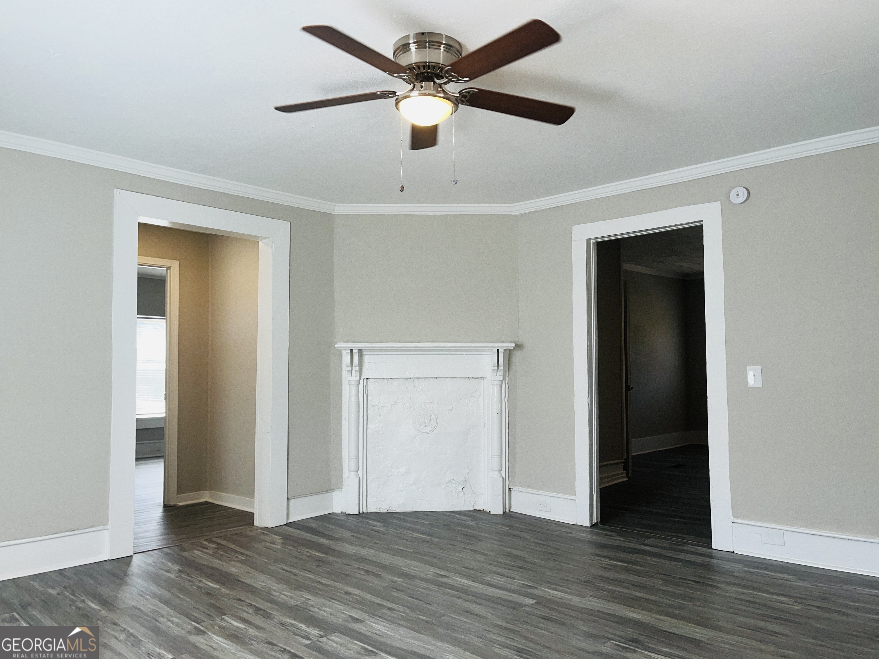 1318 Forrest Avenue LaGrange, GA 30240 - Photo 6 of 23 a view of an empty room with wooden floor