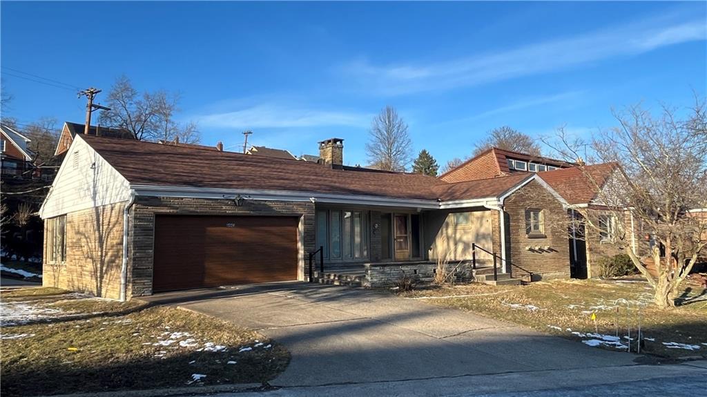 a view of house with yard
