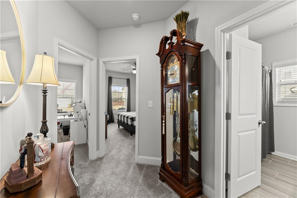 527 Gadwall Circle Jefferson, GA 30549 - Photo 20 of 42 a view of a livingroom with wooden floor and a chandelier