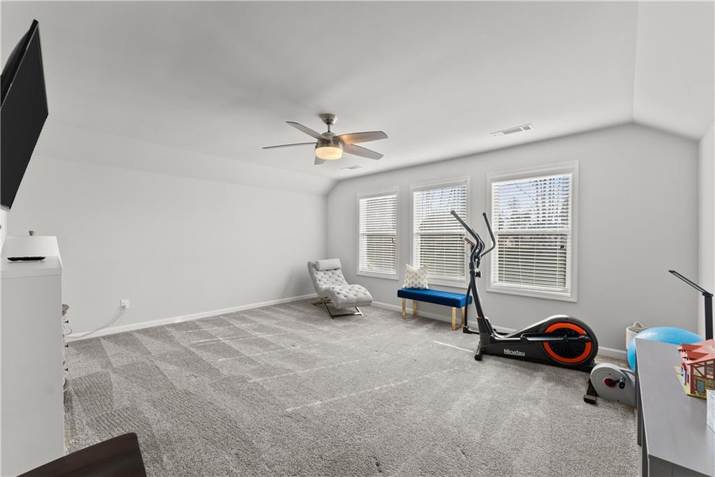 527 Gadwall Circle Jefferson, GA 30549 - Photo 27 of 42 a view of a room with gym equipment and a window