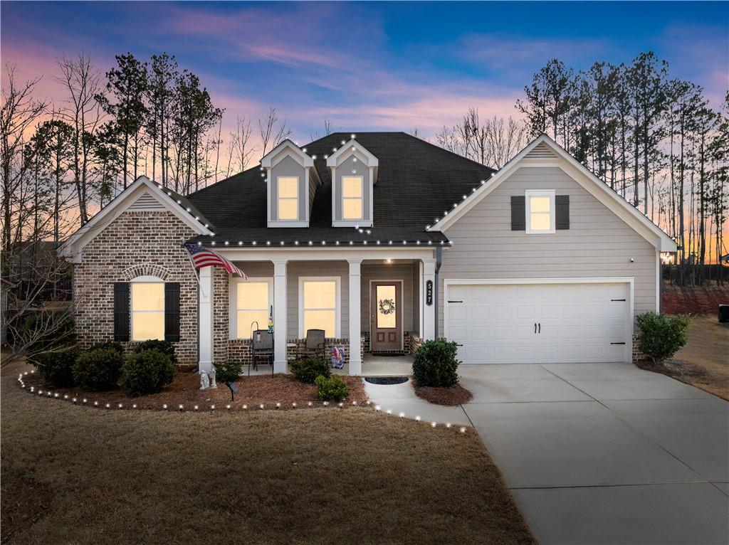 527 Gadwall Circle Jefferson, GA 30549 - Photo 3 of 42 a front view of a house with a yard and garage