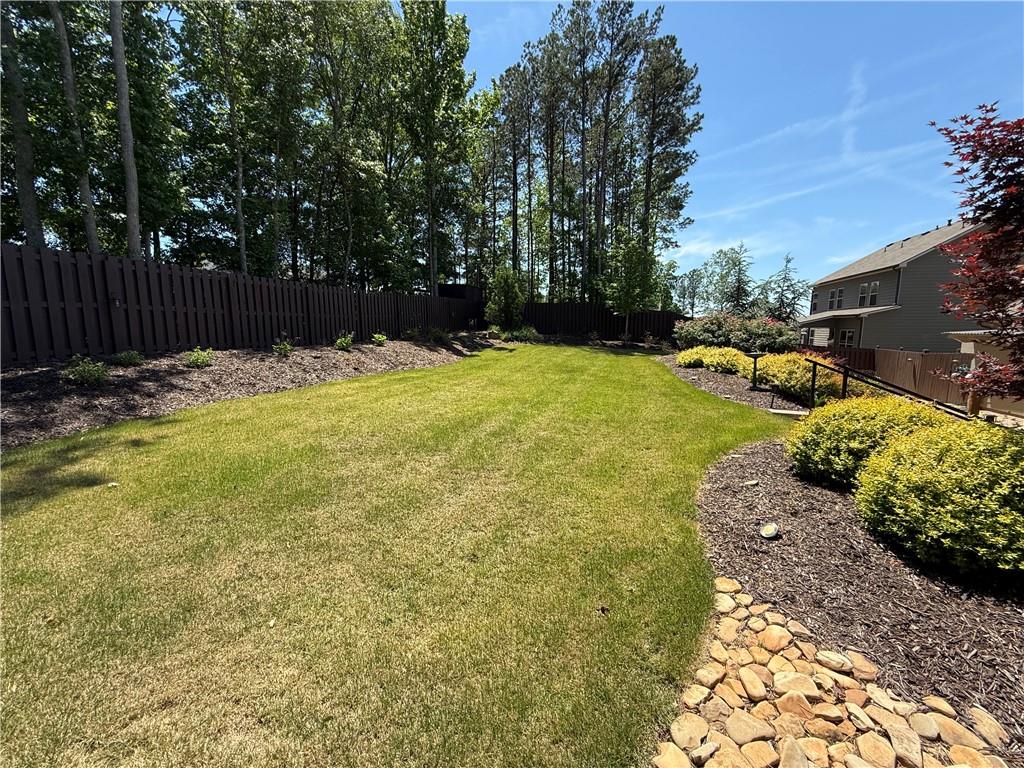 527 Gadwall Circle Jefferson, GA 30549 - Photo 38 of 42 a view of backyard with swimming pool and seating space