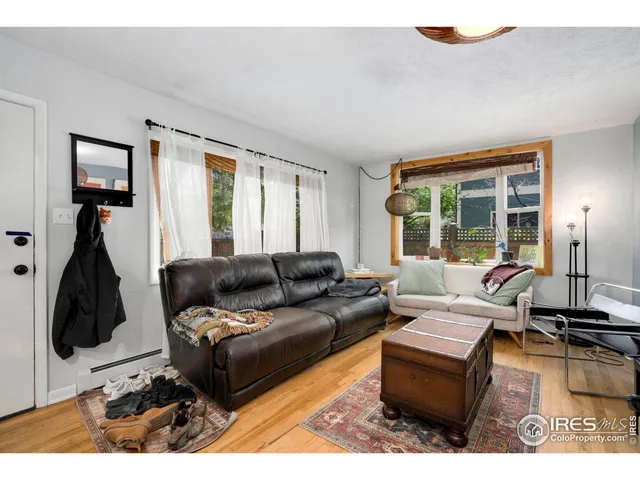 a living room with a couch and a table