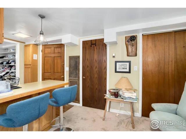 a kitchen with stainless steel appliances granite countertop a sink dishwasher stove refrigerator and cabinets