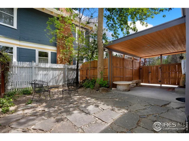 a view of backyard with green space