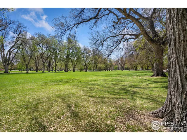 a view of a building with a street