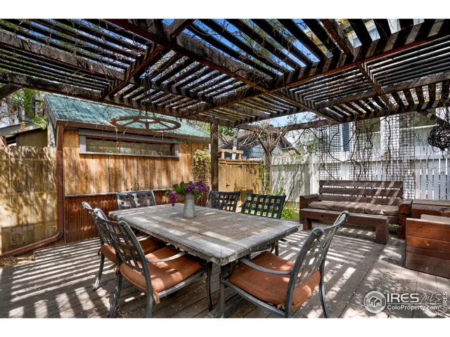 a view of a tables and chairs in patio