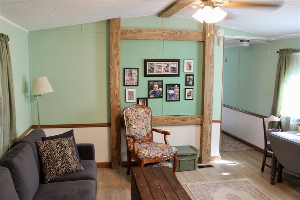 75 South Street, Unit 3 Bernardston, MA 01337 - Photo 12 of 20 a living room with furniture and a wooden floor