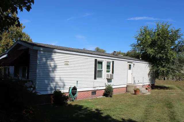 a front view of house with yard