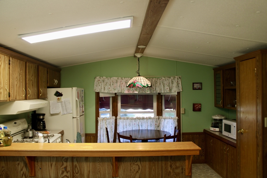 75 South Street, Unit 3 Bernardston, MA 01337 - Photo 8 of 20 a bathroom with a sink a large mirror and a shower