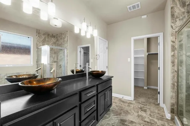 a room with a table and chairs