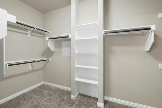 a view of an empty walk in closet