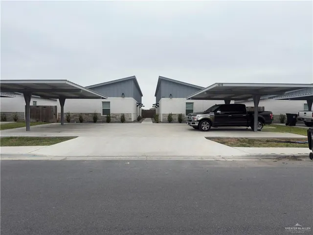 a car parked in front of a house