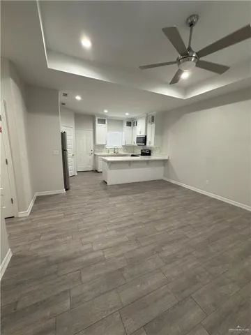 a view of kitchen and sink