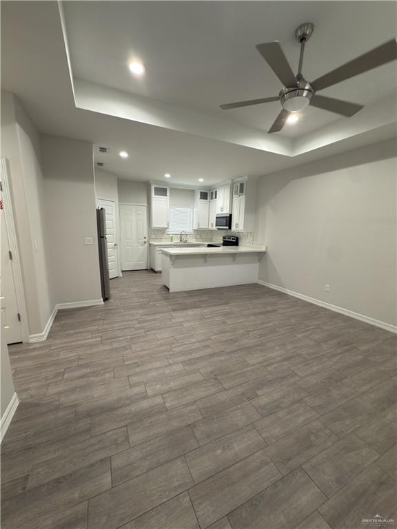 1619 Playa Drive, Unit 1 Weslaco, TX 78596 - Photo 3 of 11 a view of kitchen and sink