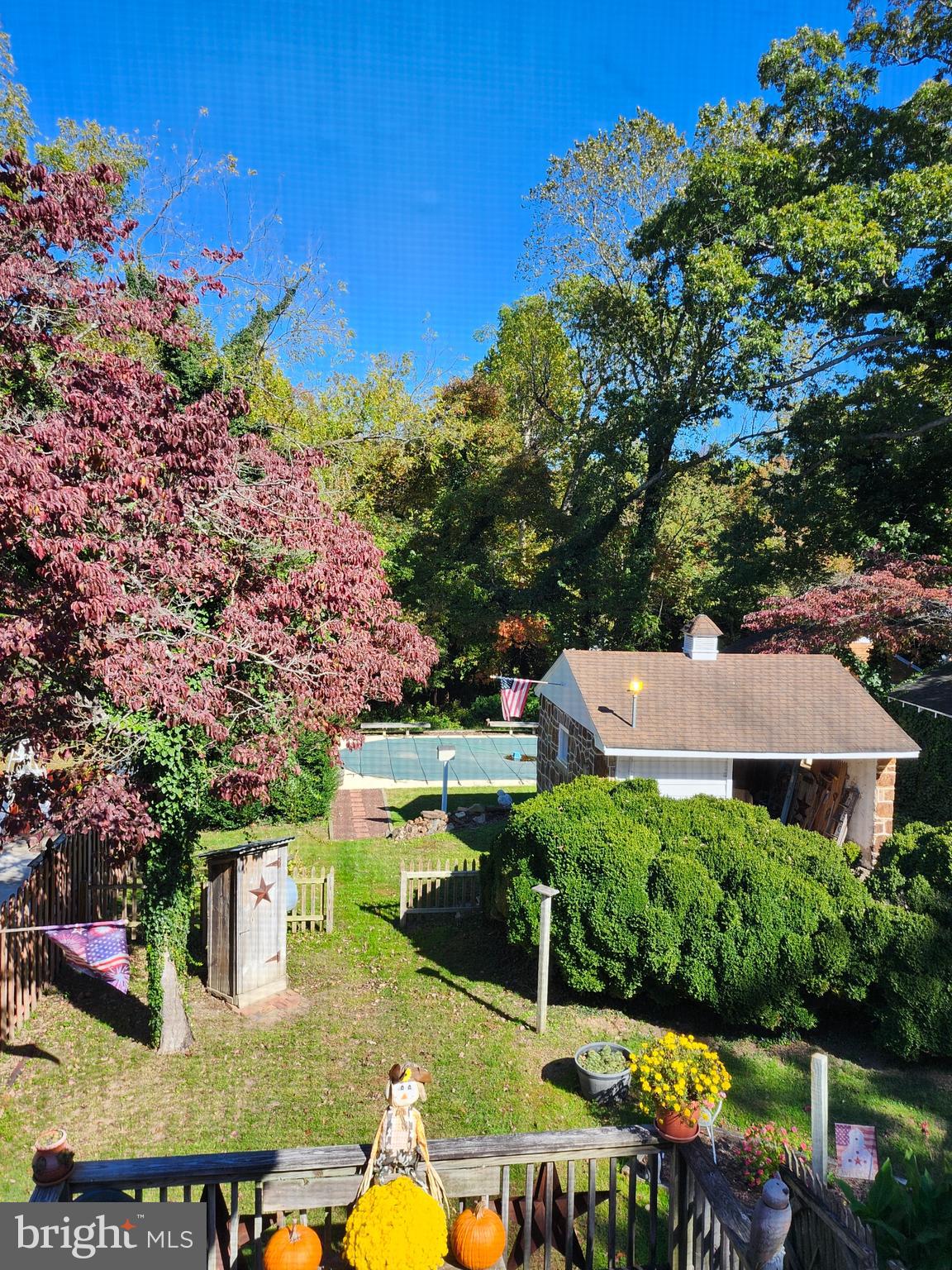 225 West Commerce Street Bridgeton, NJ 08302 - Photo 13 of 19 a view of a patio with table and chairs and potted plants