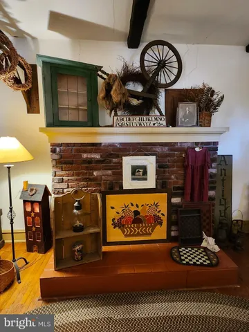 a view of fireplace and living room